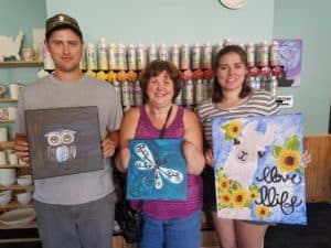 Quad Amputee with son and daughter, amputee painting art escape, family time