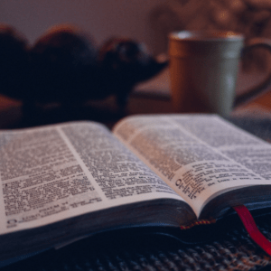 open bible, coffee cup