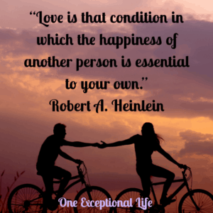 couple holding hands on bikes at sunset, robert heinlein quote