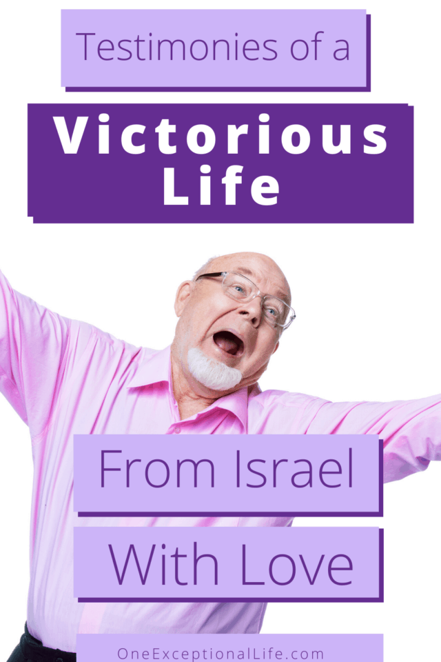 happy man showing victory in Jesus