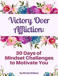 Victory Over Affliction book cover framed by flowers