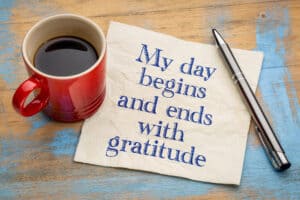 daily gratitude list, coffee and napkin